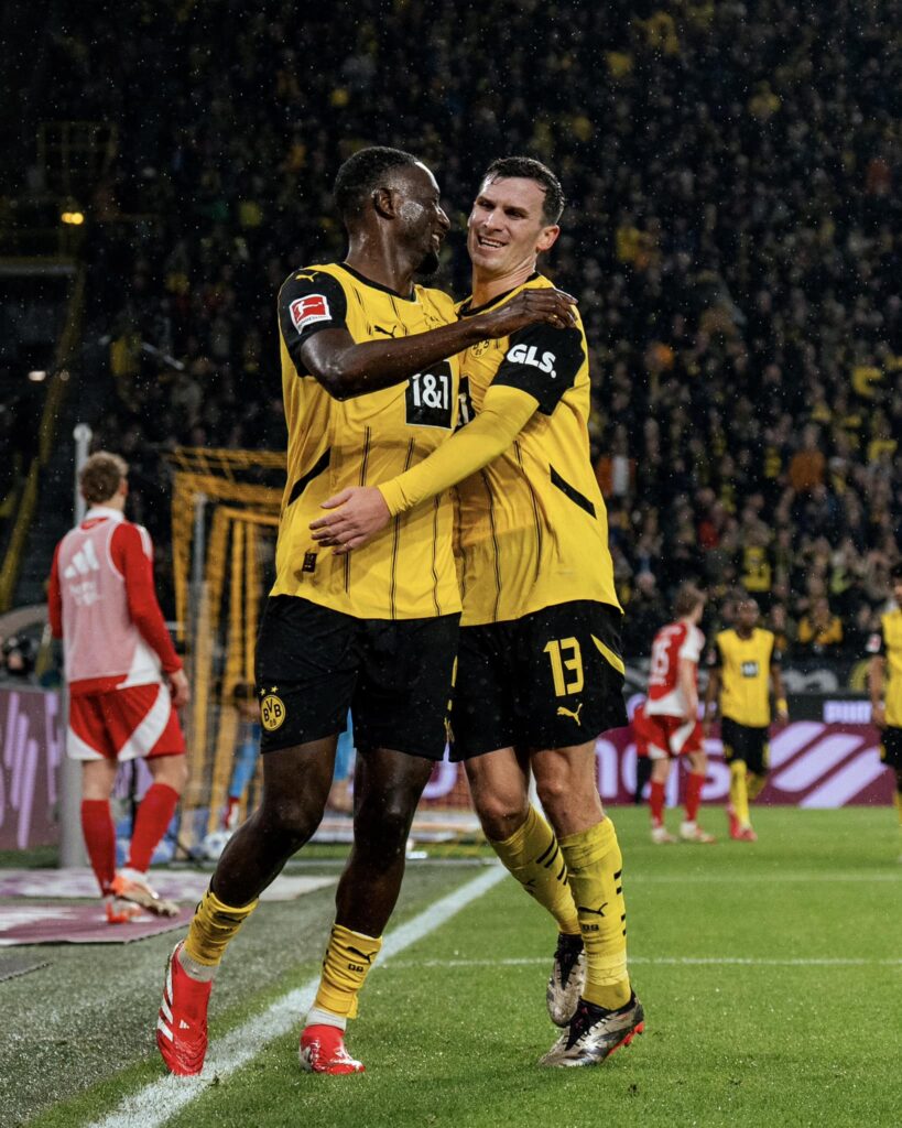 Bundesliga: Guirassy leads Dortmund to another victory; assist for Amoura in Wolfsburg win