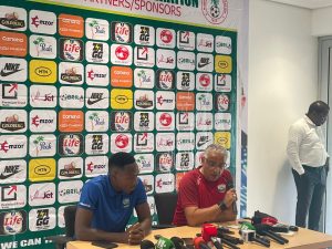 Rwanda coach Adel Amrouche and captain Djihad Bizimana speak at a pre-match press conference before their clash with Nigeria in 2026 FIFA World Cup qualifying