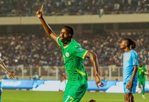 Pape Matar Sarr celebrates his goal for Senegal against DR Congo in Kinshasa during a 2026 World Cup qualifying match
